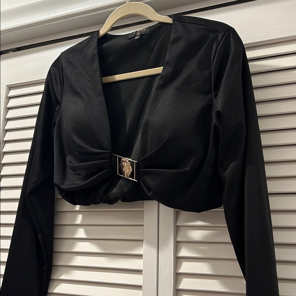 Tops - Sexy black crop top with lion hardware with built-in bra cups.
